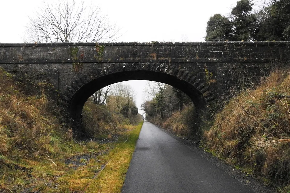 A stone railway bridge spanning the Old Rail Trail in Stokestown